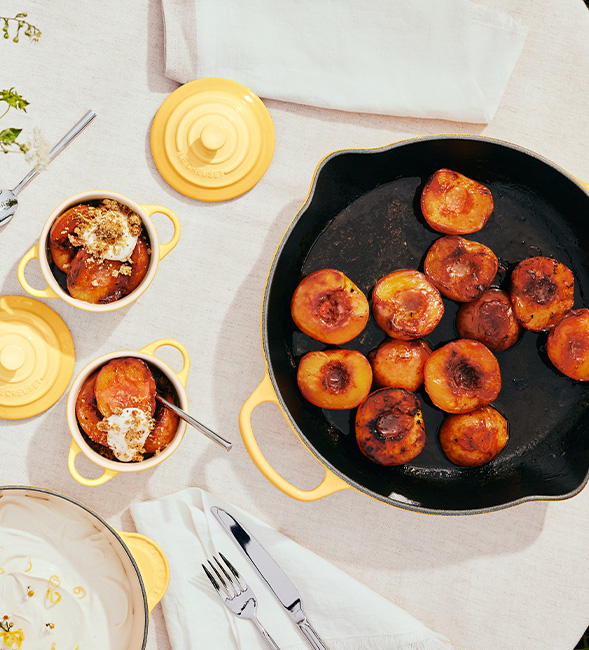 Caramelised Peaches with White Chocolate Cream and Almond-Pistachio Crumble